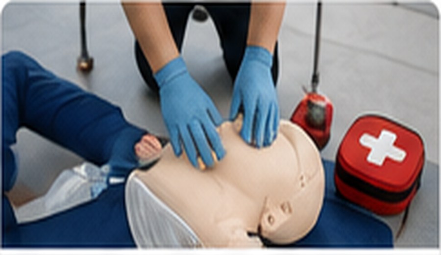 Emergency first aid training with CPR mannequin
